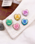 Anti-Valentine heart pins