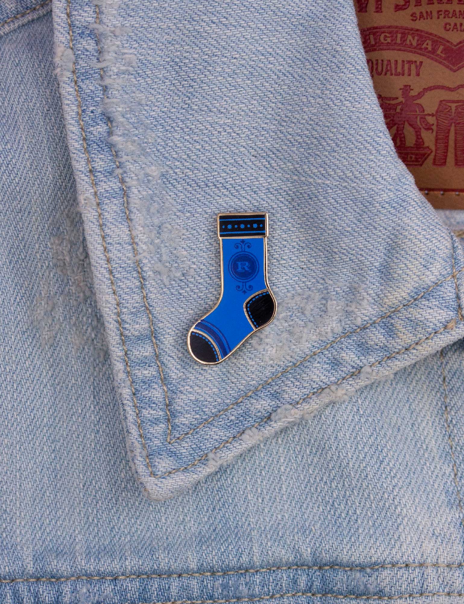 House sock enamel pin